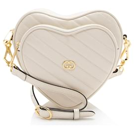Mini borsa a tracolla Gucci Matelasse in pelle con G intrecciato