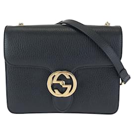 Borsa a tracolla Gucci in pelle con catena Interlocking G