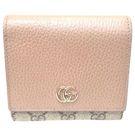 Cartera Bi-fold Gucci en piel beige
