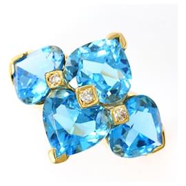Autre Marque Anello a fascia in oro giallo 18K con topazio blu e diamante