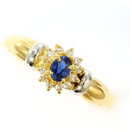 Autre Marque Anello a fascia in platino e oro giallo con zaffiro e diamante