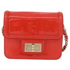 Chanel Reissue 2.55 Clutch in pelle vernice