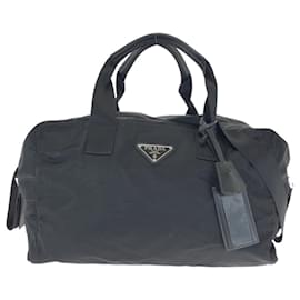 Borsa da viaggio in nylon Prada con logo Triangle Tessuto