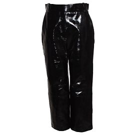 Khaite, pantaloni melie in pelle lucida
