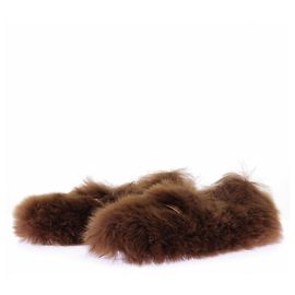 Tod's Mocassini "Gommimo" in shearling marrone