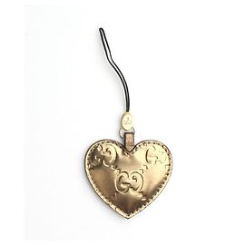 Gucci Charm per borsa in pelle a cuore dorato