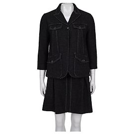 Completo giacca e gonna in tweed marrone Louis Vuitton Taglia 38 Usato