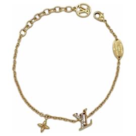 Pulsera charm en metal dorado Louis Vuitton