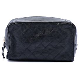 Pochette de cosméticos Chanel en piel de cordero acolchada negra