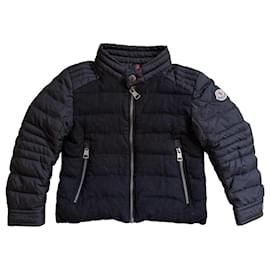 Moncler gesteppte schwarze Daunenjacke mit Wolleinsätzen