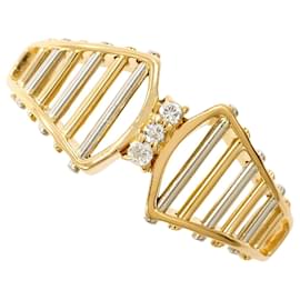 Anello band in platino e oro giallo con diamante - Autre Marque