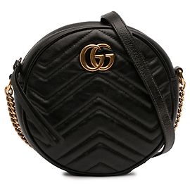 Gucci Borsa a tracolla rotonda in pelle matelassé Mini GG Marmont nera
