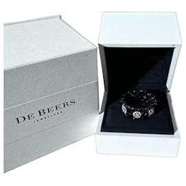 Anello De Beers Enchant Lotus Ceramica Nera Platino e Diamante