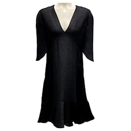 Chloé Vestido corto de seda acanalada con brillo y cuello en V negro Chloe