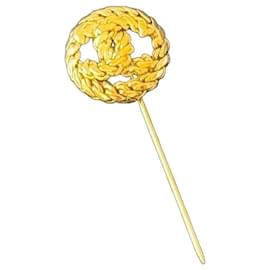 Spilla Chanel CC intrecciata dorata