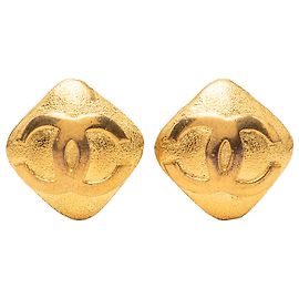 Orecchini Chanel Gold CC placcati oro a forma di rombo con clip