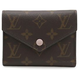 Carteira Victorine dobrável monogram Louis Vuitton