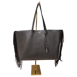 Bolso Tote Saint Laurent de piel negra con flecos
