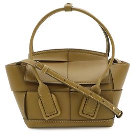 Borsa Bottega Veneta Maxi Intrecciato Mini Arco in pelle
