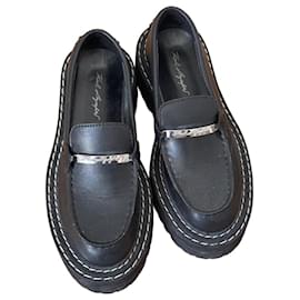 Mocassini Karl Lagerfeld in pelle nera con suola chunky