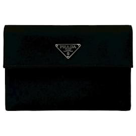 Cartera plegable de nylon Tessuto con logotipo Triangle de Prada y detalles en cuero