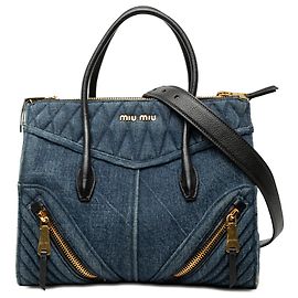 Tote Biker in denim matelassé blu Miu Miu