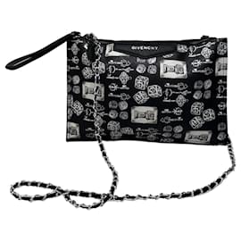 Clutch Vintage Givenchy in tela gommata Nero Bianco