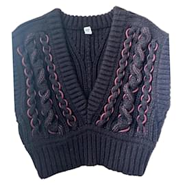 Suéter de cashmere Hermès marrón con detalles en cuero