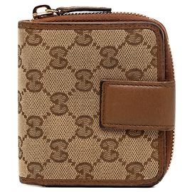 Cartera pequeña plegable Gucci en lona GG beige
