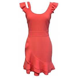 Alexander McQueen Mini-Rüschenkleid aus Korallenfarbenem Compact-Strick