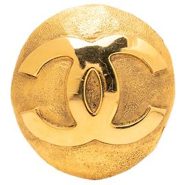 Broche redonda Chanel Gold CC bañada en oro