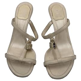 Christian Dior Mule con lucchetto in pelle avorio