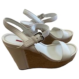 Prada Sandali zeppa in pelle bianca