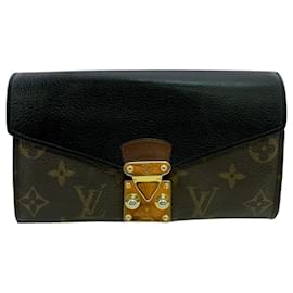 Portafoglio bi-fold Louis Vuitton Pallas Flap Lock Monogram