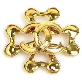 Spilla in metallo dorato Chanel