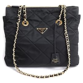 Borsa a tracolla con catena Prada Re-Edition 1995