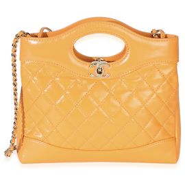 Mini borsa shopping 31 in pelle di vitello trapuntata lucida stropicciata arancione Chanel