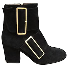 Avril Gau Botines de ante negro con hebilla dorada