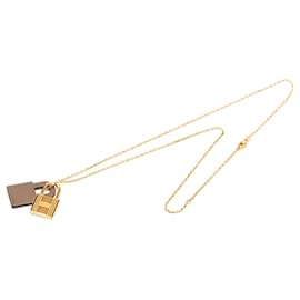 Collier pendentif O Kelly en cuir Swift plaqué or Hermès Gold