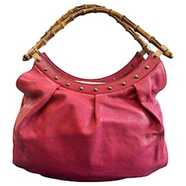 Gucci Handtasche aus rosa Leder mit braunem Bambusgriff