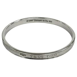 Bracciale rigido stretto in argento con incisione del logo Tiffany & Co.