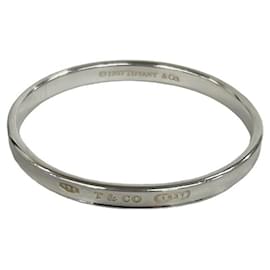Bracciale rigido stretto in argento 925 con logo inciso Tiffany & Co.
