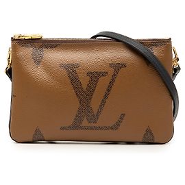 Pochette Louis Vuitton Brown Monogram Giant Reverse Double Zip