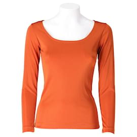 Haut à manches longues à col rond en spandex orange des années 70 Yves Saint Laurent