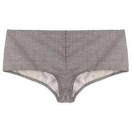 Pantaloncini in lana Versace 90s neri e beige con motivo pied-de-poule e fodera con logo