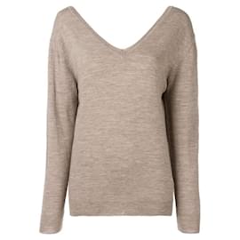 Suéter de lana beige de los 90 Maison Martin Margiela con cuello en V y hombros caídos