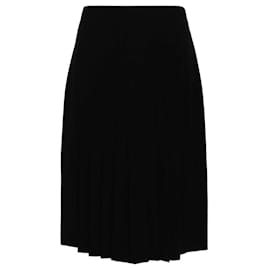 Chanel 90er Jahre ausgestellter Faltenrock aus schwarzer Wolle mit hoher Taille und Seidenfutter