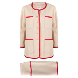 Chanel 80er Jahre Anzug aus beigem Wolle mit rotem Besatz: Jacke & Midirock