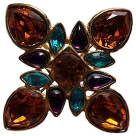 Broche papillon Yves Saint Laurent en métal doré et pierres multicolores