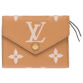Accesorio LOUIS VUITTON Victorine en Cuero Beige - 103614